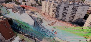Simulação CFD – linhas de corrente de ar sobrepostas a uma vista aérea exterior do estaleiro da estação RER de Issy, com edifícios residenciais circundantes